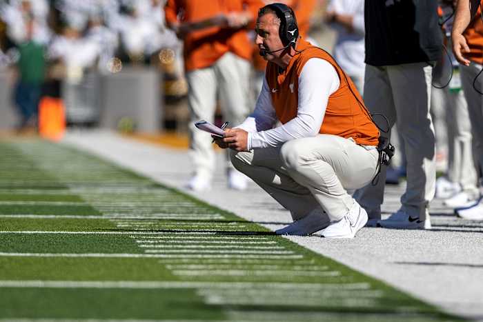 Texas Longhorns head coach Steve Sarkisian watches as his team competes against Baylor Bears in the first half of an NCAA football game at McLane Stadium.